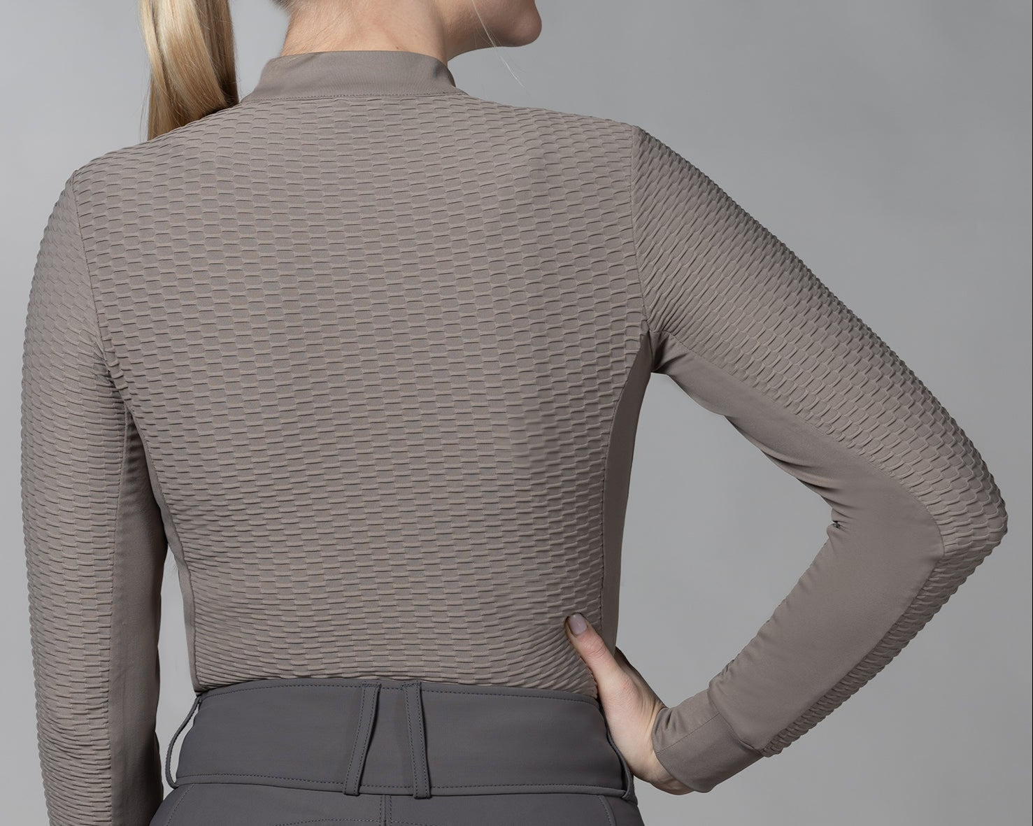 Schockemöhle SPGail Style Shirt - Hazel Brown, back view on model with gray background | Malvern Saddlery