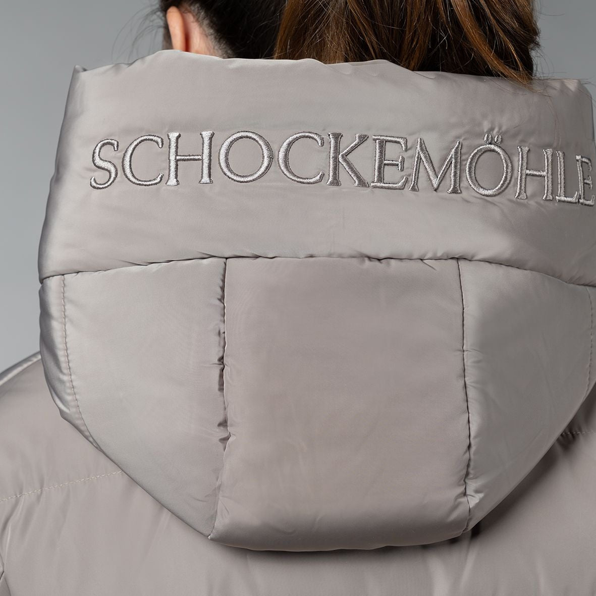Schockemöhle Violet Puffer Jacket - Hazel; on woman back hood detail | Women's Outerwear | Malvern Saddlery