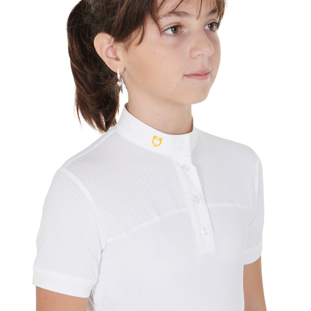Equestro Girls Slim Fit Competition Polo Shirt with mesh insert - White; close up shown on model on white background | Young Rider Show Shirts | Malvern Saddlery