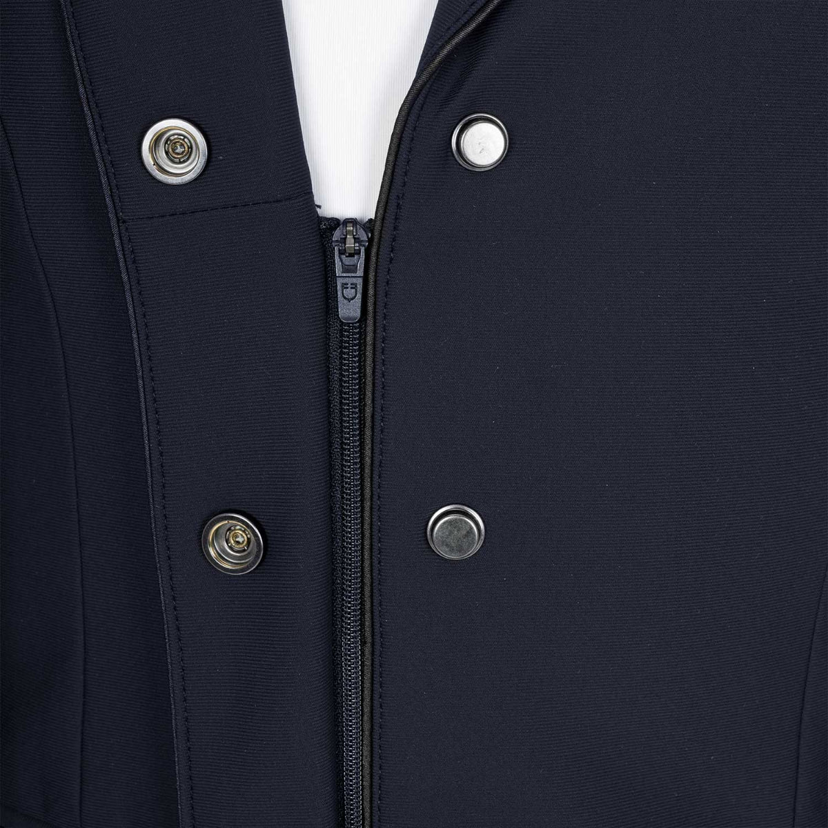 Equestro Children's Unisex Zip Competition Jacket - Navy Blazer; button & zipper detail shown on young rider on white background | Malvern Saddlery