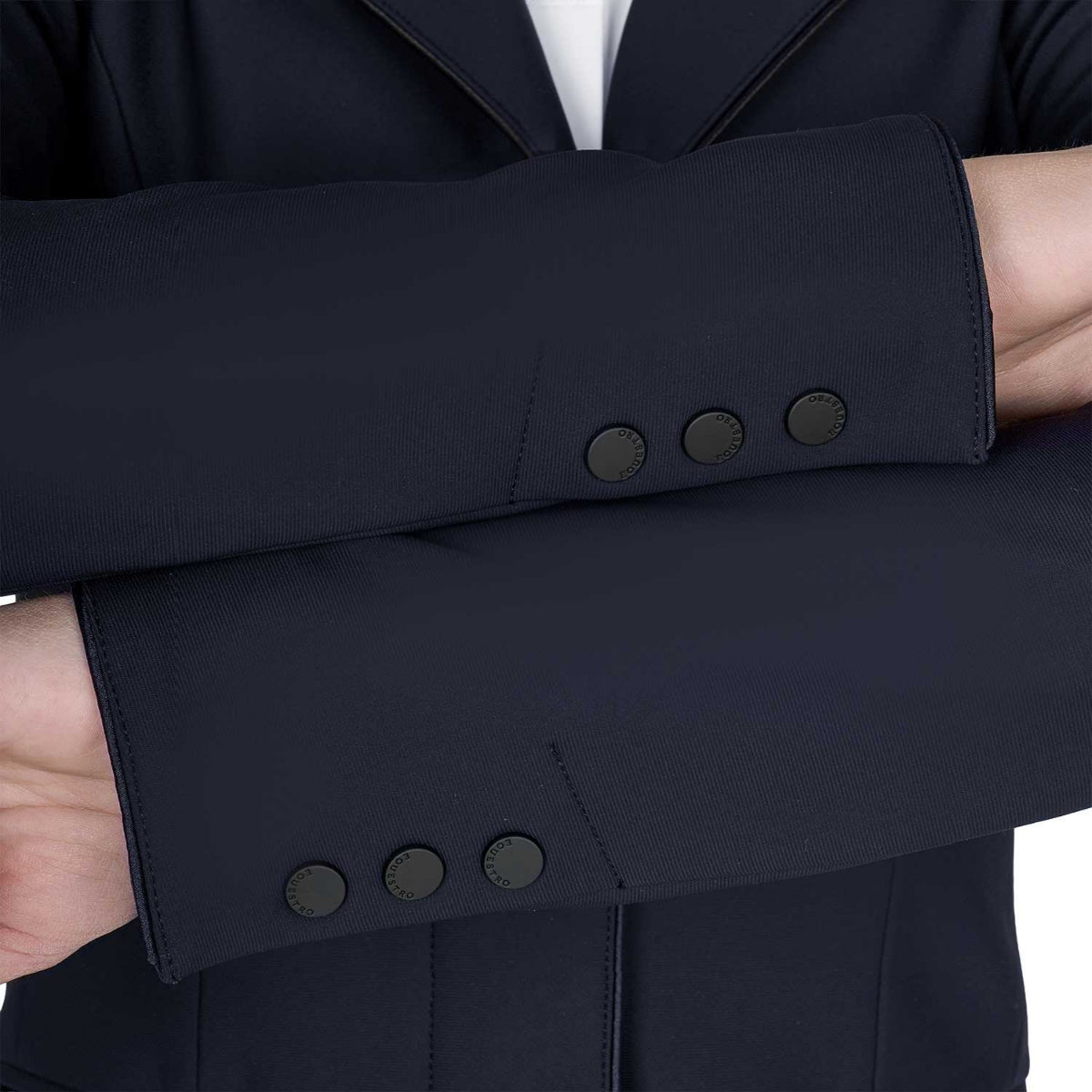 Equestro Children's Unisex Zip Competition Jacket - Navy Blazer; close up of sleeve buttons shown on young rider on white background | Malvern Saddlery