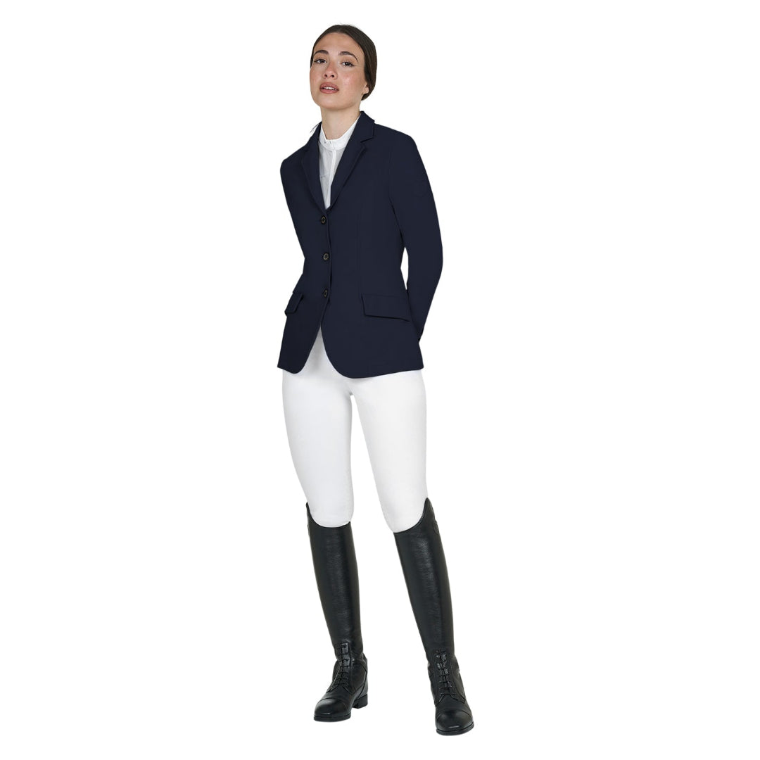 Equestro Women's Girasol Competition Jacket - Navy Blazer; full body image shown on model wearing white breeches & black riding boots, white background | Equestrian Show Coats | Malvern Saddlery
