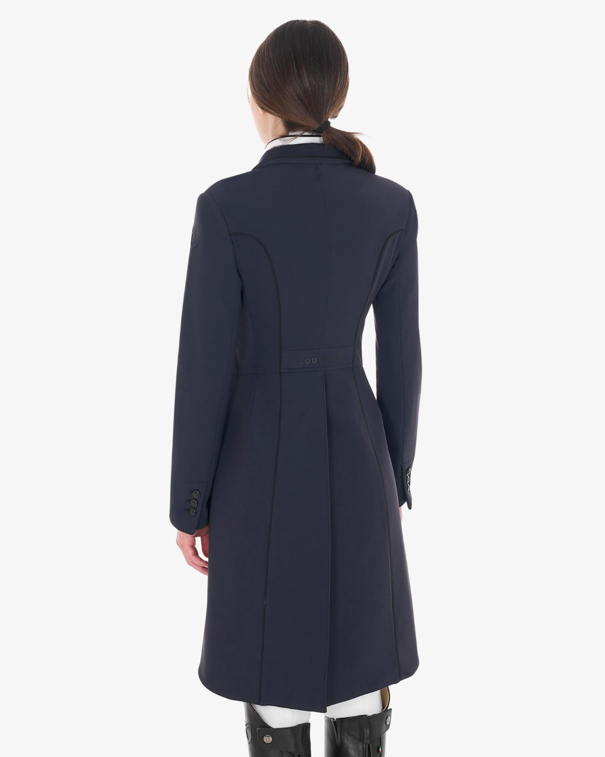 Equestro Women's Competition Dressage Shadbelly - Navy Blazer; back view shown on woman on white background | Equestrian Show Coats | Malvern Saddlery