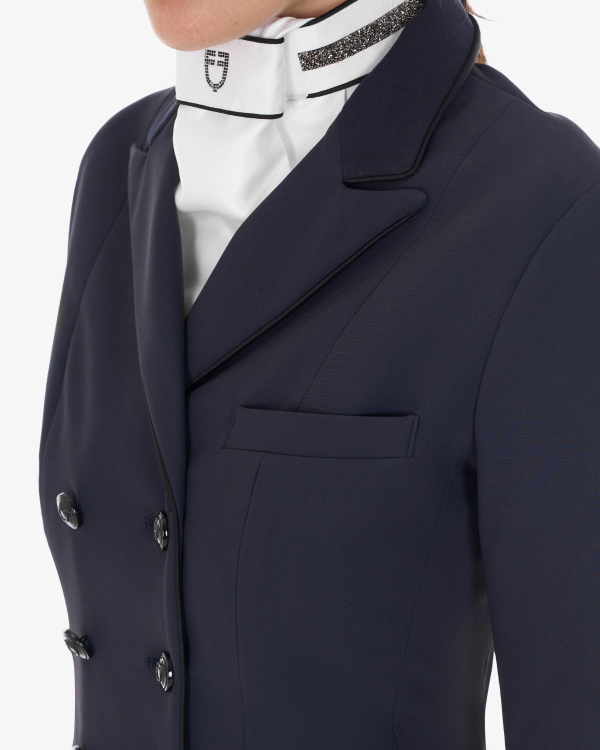Equestro Women's Competition Dressage Shadbelly - Navy Blazer; chest detail shown on woman on white background | Equestrian Show Coats | Malvern Saddlery