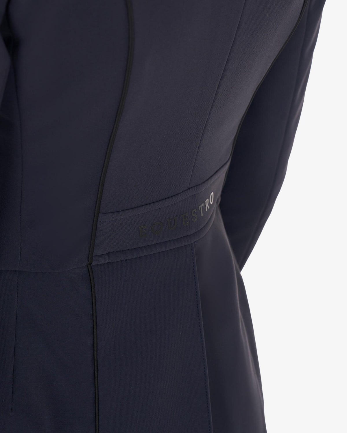 Equestro Women's Competition Dressage Shadbelly - Navy Blazer; detail back waist shown on woman on white background | Equestrian Show Coats | Malvern Saddlery