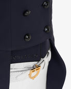 Equestro Women's Competition Dressage Shadbelly - Navy Blazer; detail tail flaps shown on woman on white background | Equestrian Show Coats | Malvern Saddlery