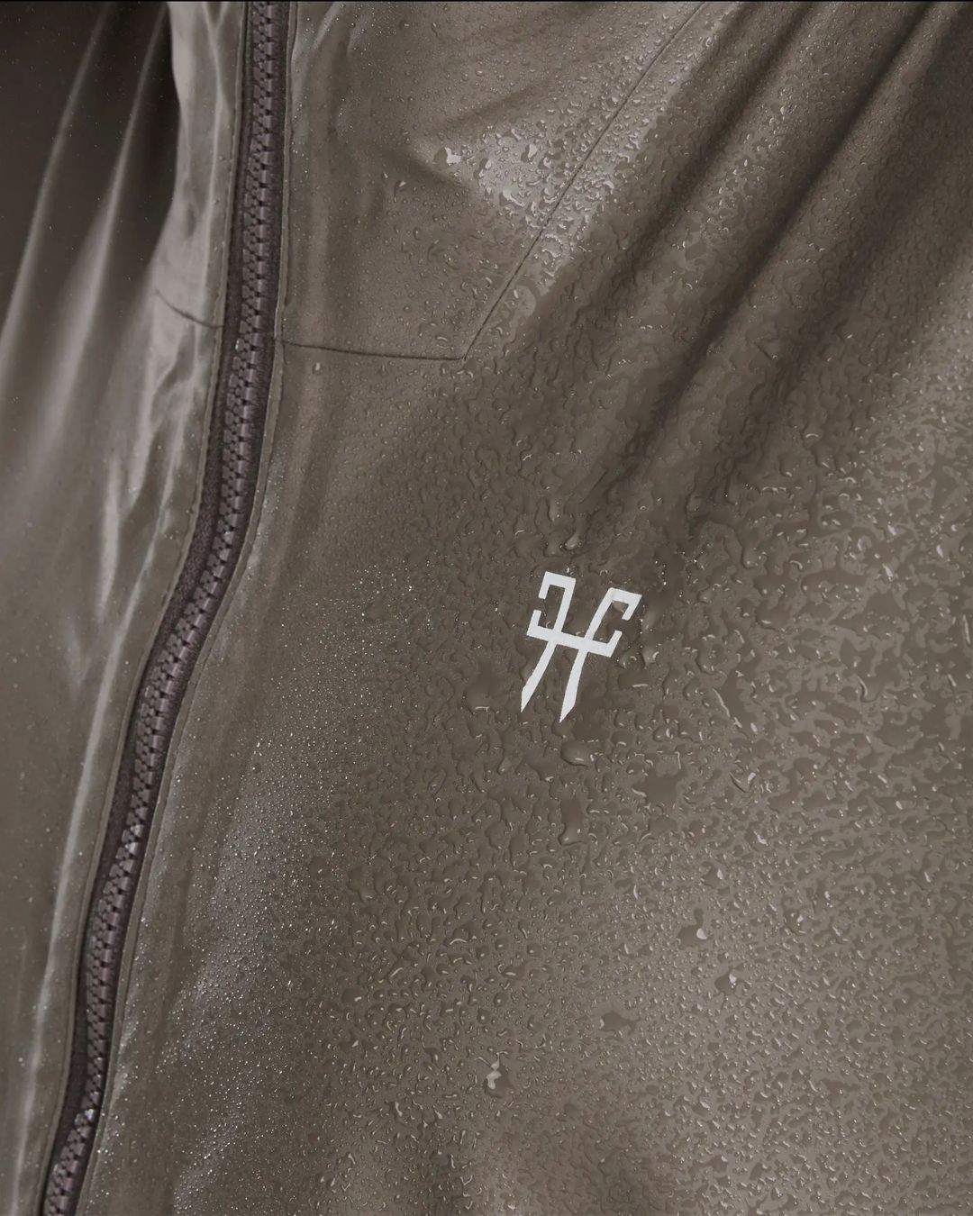 Horse Pilot Long Raintech Coat - Coffee brown - waterproof logo detail with water | Women's Outerwear | Malvern Saddlery