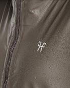 Horse Pilot Long Raintech Coat - Coffee brown - waterproof logo detail with water | Women's Outerwear | Malvern Saddlery