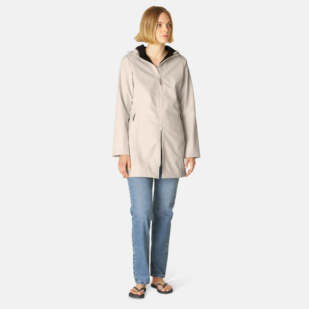 Ilse Jacobsen Softshell Raincoat - Sand; shown on woman wearing jeans | Malvern Saddlery