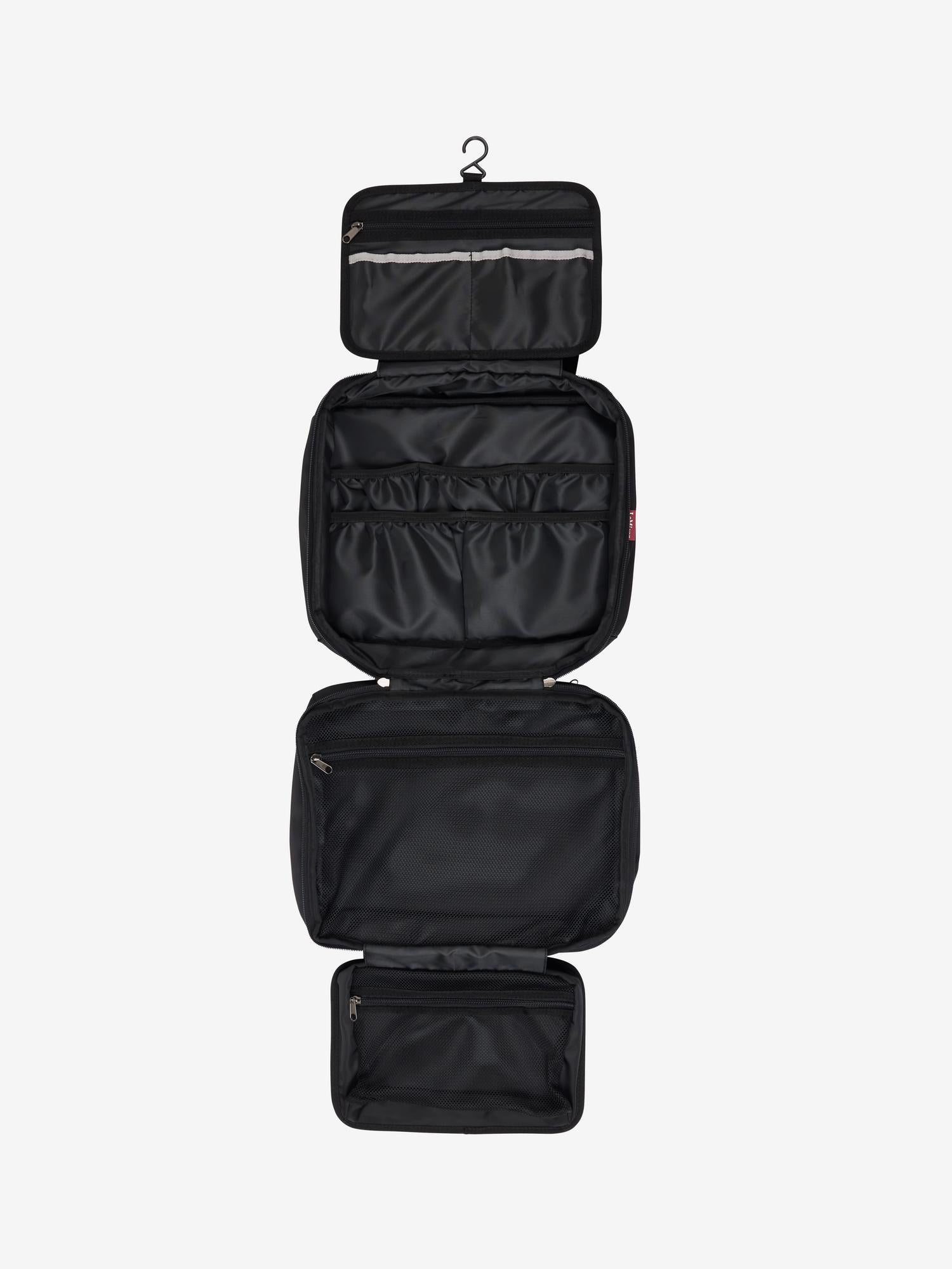 LeMieux Fold Down Pocket Organizer - Black, shown open, 4 compartments accessible | Equestrian Grooming Accessories | Malvern Saddlery
