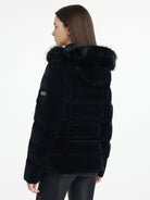 LeMieux Aspen Puffer Jacket - Black; back view shown on model wearing  | Ladies' Outerwear | Malvern Saddlery