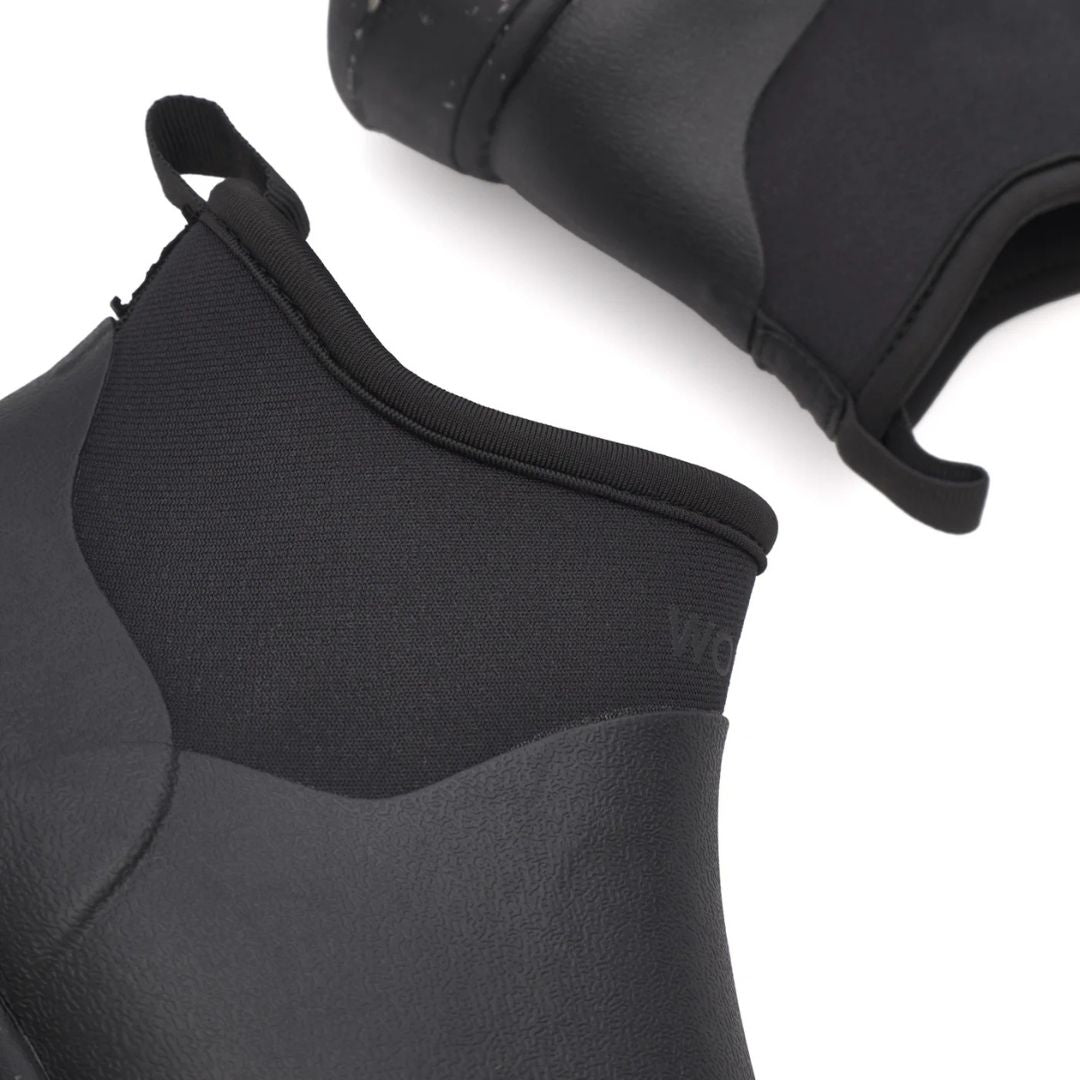 Woden Irene Waterproof Boot - Black on white background, detail of ankle | Malvern Saddlery