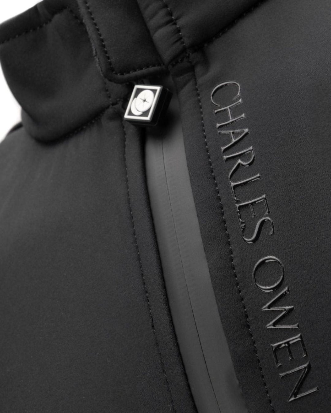 Charles Owen Eclipse Back Protector - Black; neck and zipper detail shown on white background | Equestrian Protective Vests | Malvern Saddlery