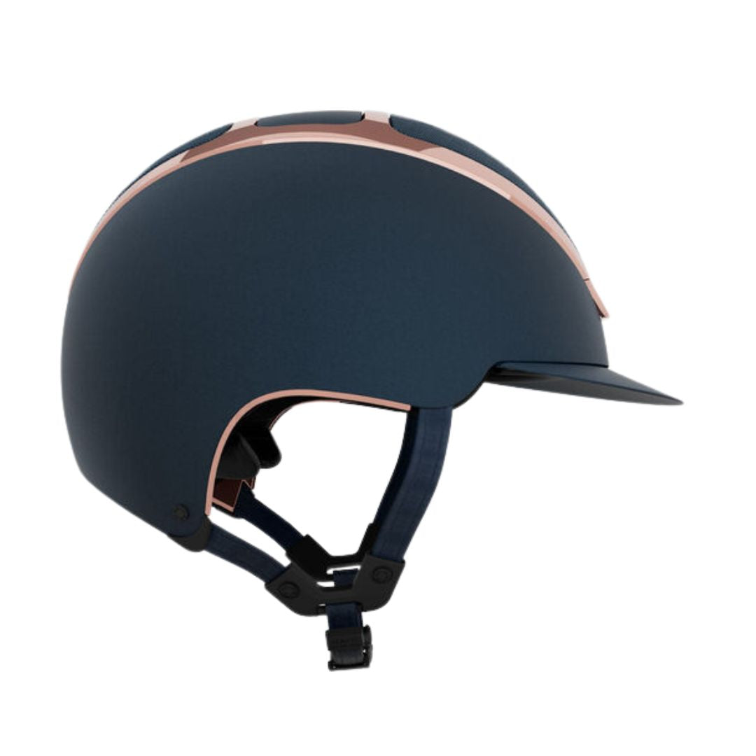 Kask Dogma Chrome Equestrian Helmet - Navy Matte with Rose Gold Frame; side view on white background | Standard Brim English Riding Helmets | Malvern Saddlery