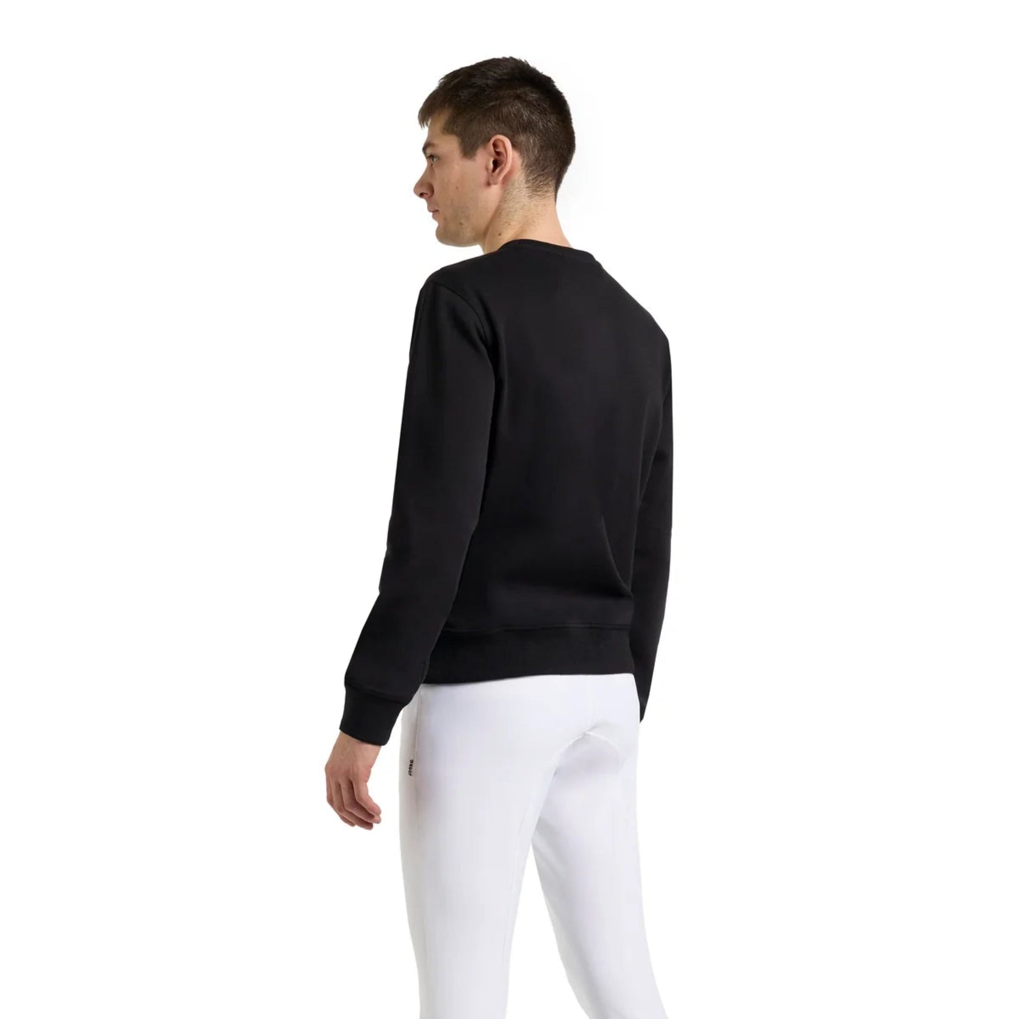 Back view of a man wearing the black EGO7 Dorian Men's Sweatshirt with white riding breeches