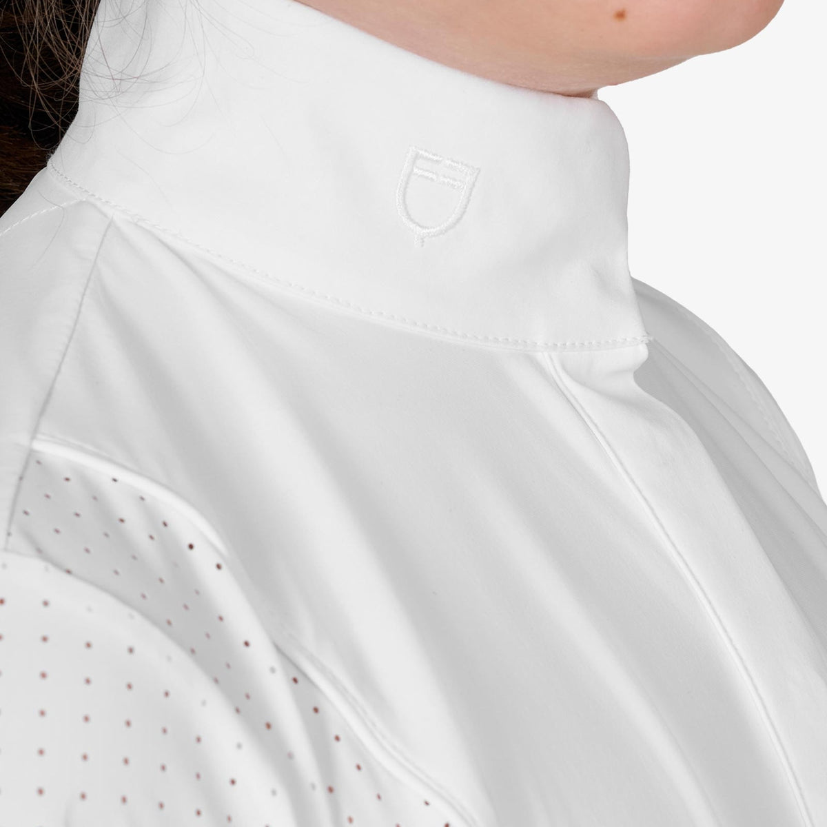 Equestro Girls' Long Sleeve Competition Polo in White collar and perforated panel close up