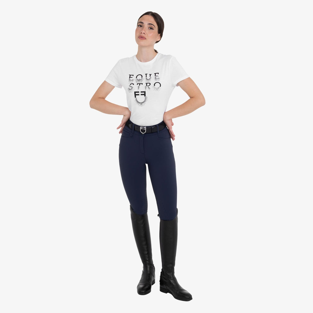 Equestro Women's Hunter Knee Grip Breeches - Navy, worn with tall boots | Malvern Saddlery