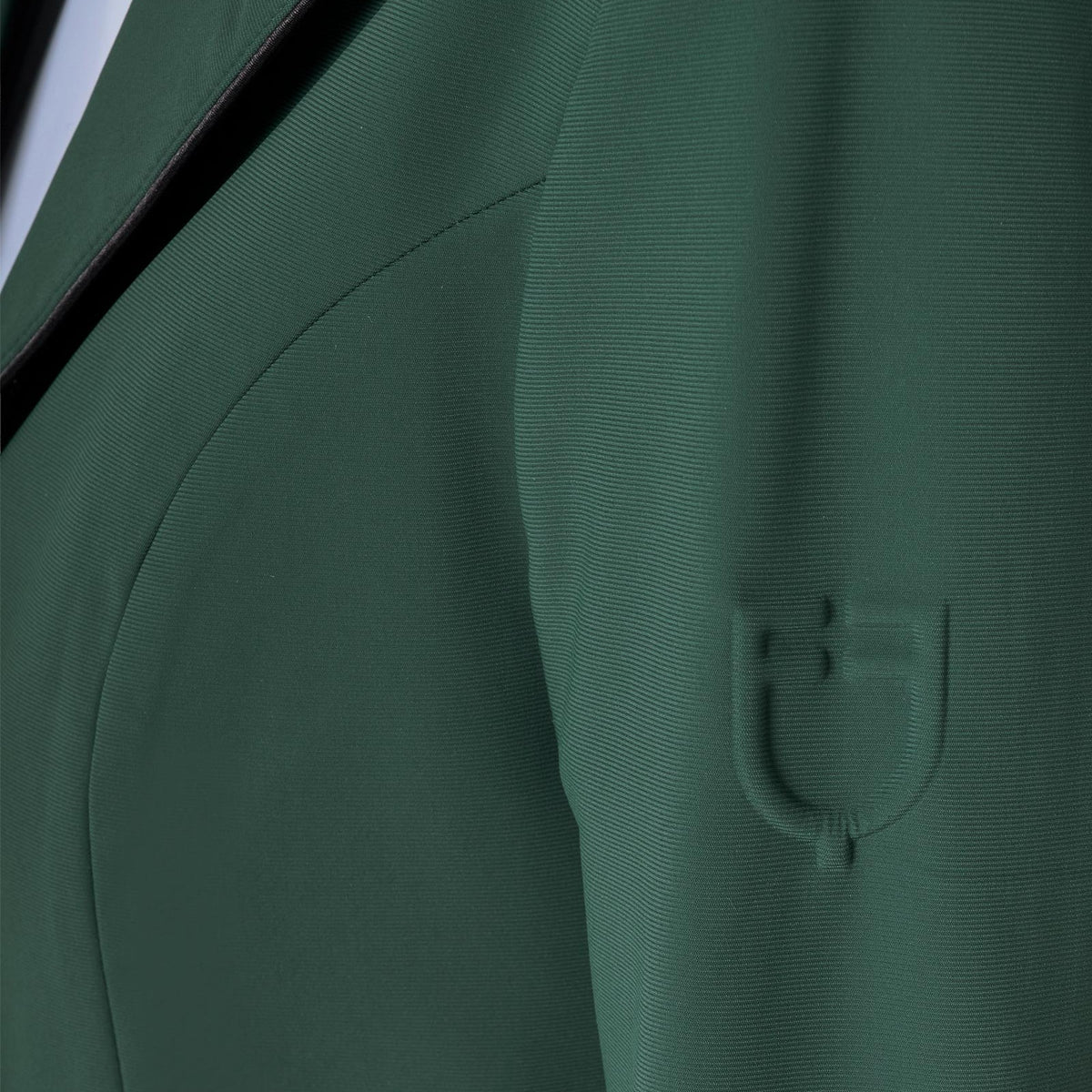 Equestro Women's Competition Jacket in Pine Grove embossed shoulder logo