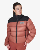Equestro Cropped Puffer Jacket - Redwood & Black; shown on woman on white background | Ladies Outerwear | Malvern Saddlery