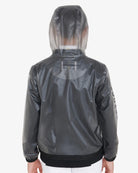 Equestro Young Rider Unisex Raincoat - back view shown on boy wearing show coat under, white breeches  | Children's Riding Apparel | Malvern Saddlery