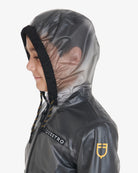 Equestro Young Rider Unisex Raincoat - close up view shown on boy with hood up  | Children's Riding Apparel | Malvern Saddlery