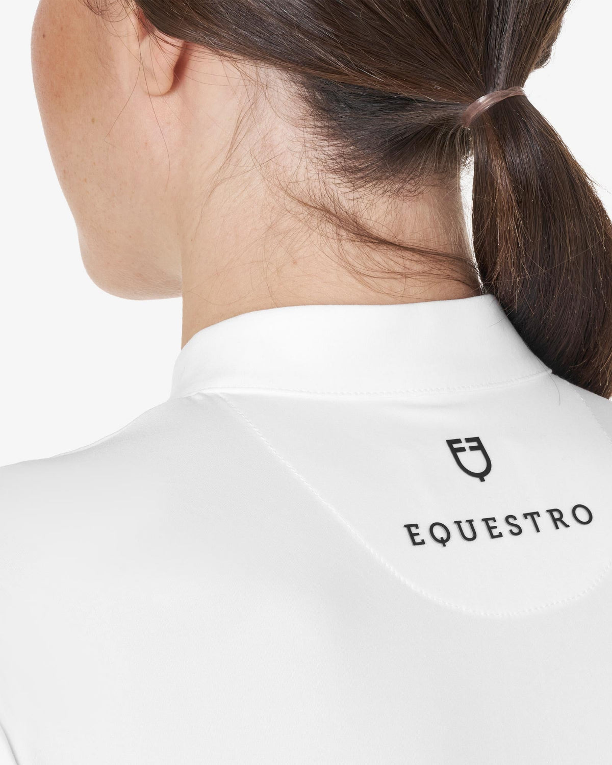 Equestro Women's Crystal Zip Show Shirt; back neck detail shown on woman against white background | Equestrian Competition Shirts | Malvern Saddlery