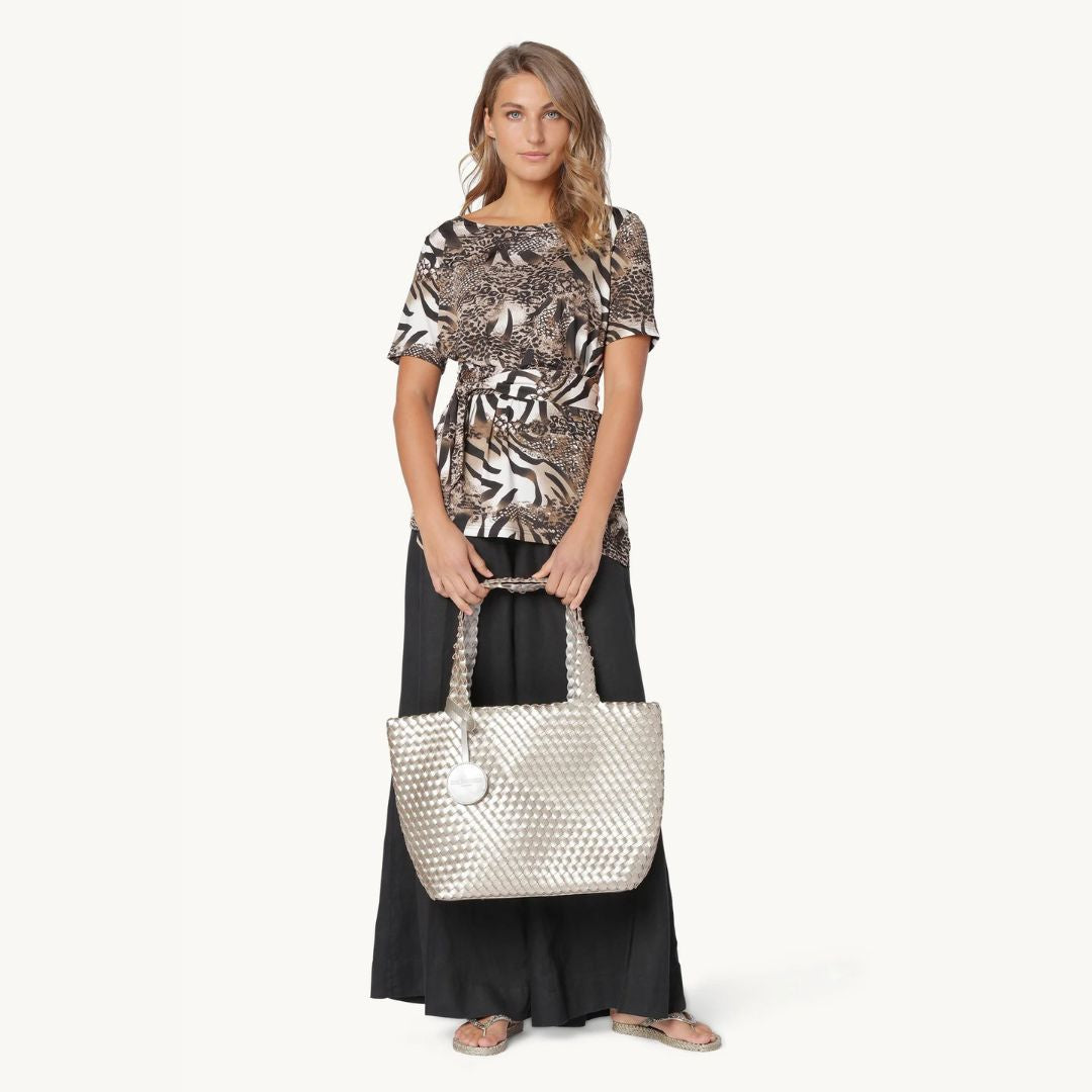 Ilse Jacobsen Braided Reversible Tote - Platinum/Silver;woman holding silver tote on white background | Handbags | Malvern Saddlery