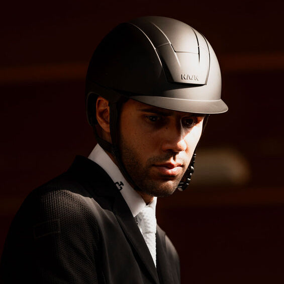 KASK Kooki Shadow Helmet - Black Man wearing with a blurred background | Malvern Saddler