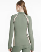 LeMieux Philippa Mesh Ladies Base Layer Top - Rosemary Green, shown on woman - back view | Athletic Wear | Malvern Saddlery