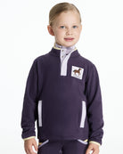 LeMieux Mini Mae Popper Fleece - Juniper Purple Pullover - shown on young girl on white background | Children's Activewear | Malvern Saddlery