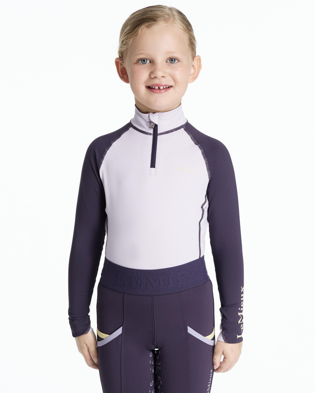 LeMieux Mini Base Layer Top - Lilac, shown on young girl | Children's Riding Apparel | Malvern Saddlery