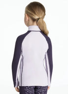 LeMieux Mini Base Layer Top - Lilac, shown on young girl, back view | Children's Riding Apparel | Malvern Saddlery