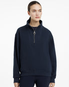 LeMieux Keira Quarter Neck Sweatshirt - Navy, shown on person with white background | Athleisure | Malvern Saddlery