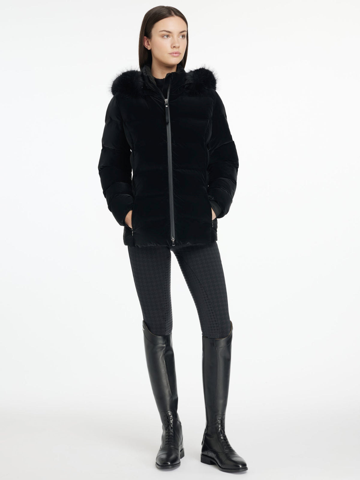 LeMieux Aspen Puffer Jacket - Black; shown on model wearing riding pants & boots | Ladies' Outerwear | Malvern Saddlery