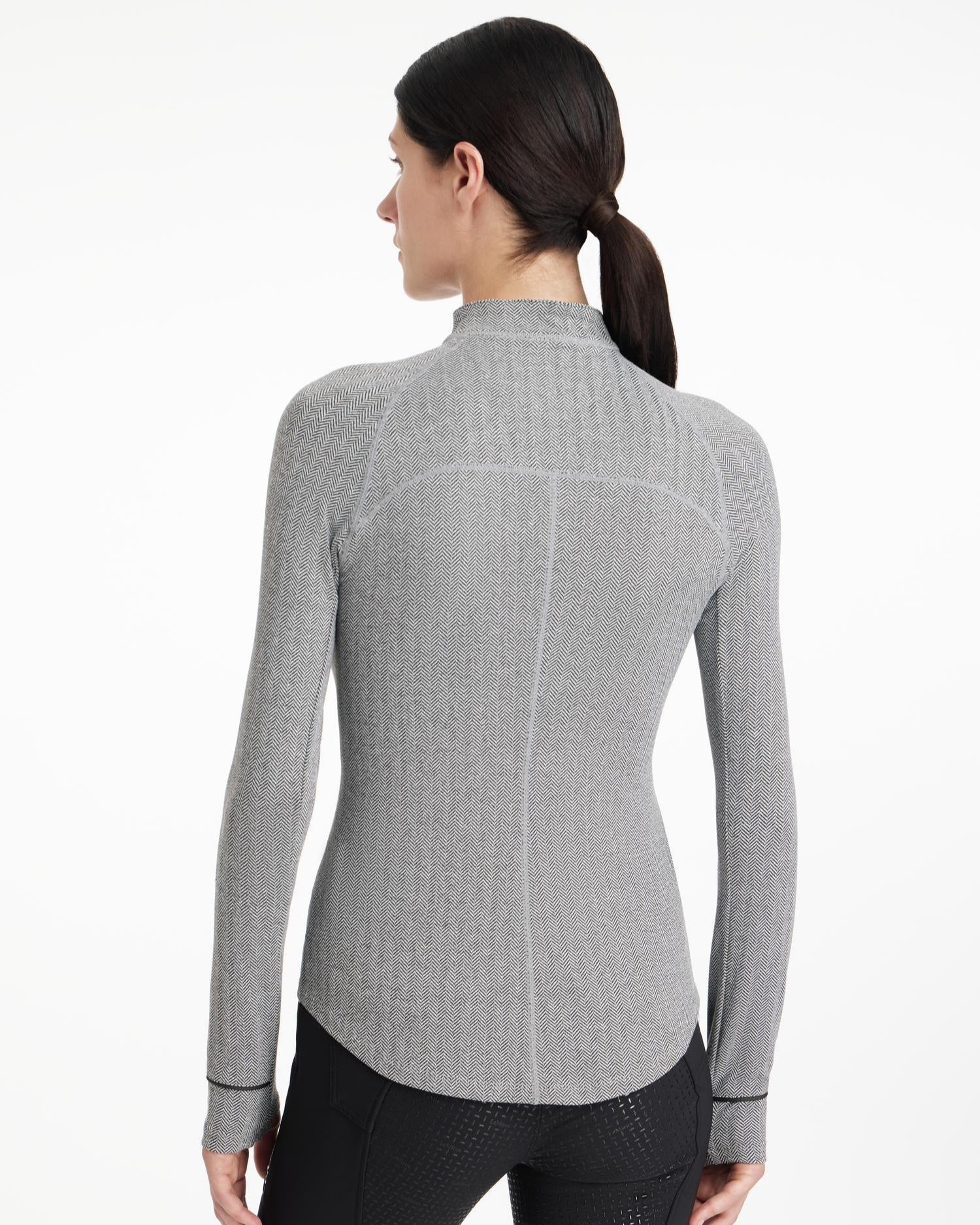 LeMieux Aspen Herringbone Base Layer; back view on woman | Ladies' Athleisure | Malvern Saddlery