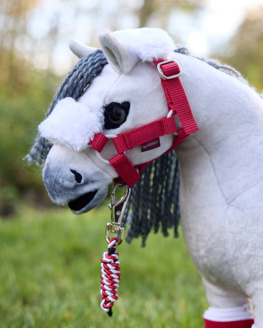 LeMieux Toy Pony Christmas Halter with Lead Rope - red & white; shown on 'Blanca' | Malvern Saddlery