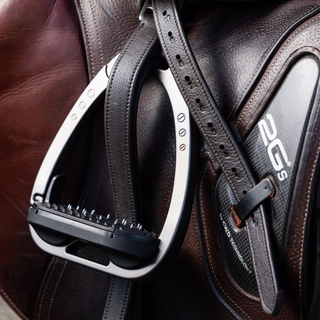 LeMieux Arika Stirrup Leathers - Brown; shown on saddle with stirrup | Tack Shop | Malvern Saddlery