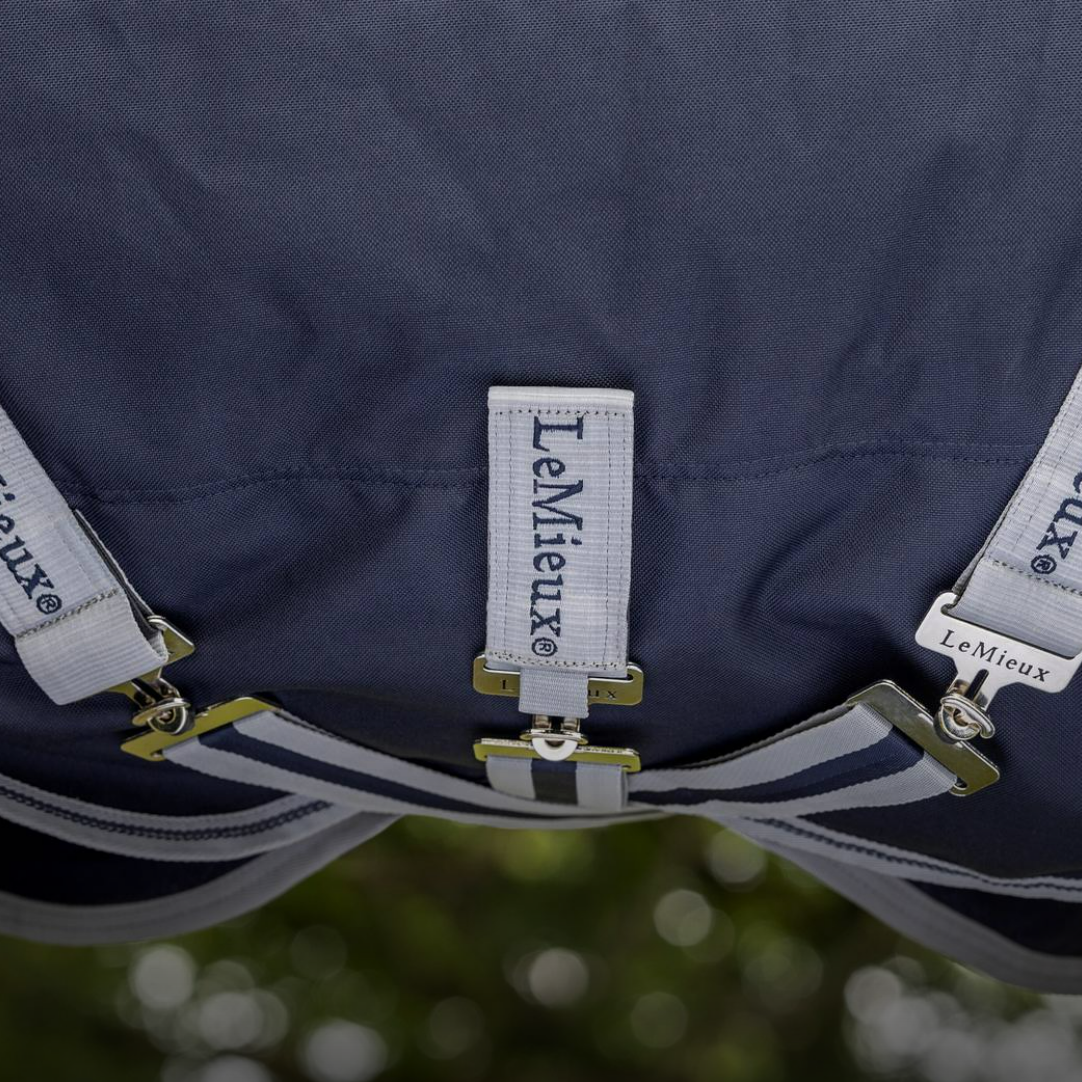 LeMieux Arika Storm-Tek Horse Rug Navy - detail of crossed surcingles | Horse Blankets | Malvern Saddlery