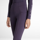 LeMieux Young Rider Orla Pull Ons - Juniper Purple, close up knee to waist shown on model | Malvern Saddlery
