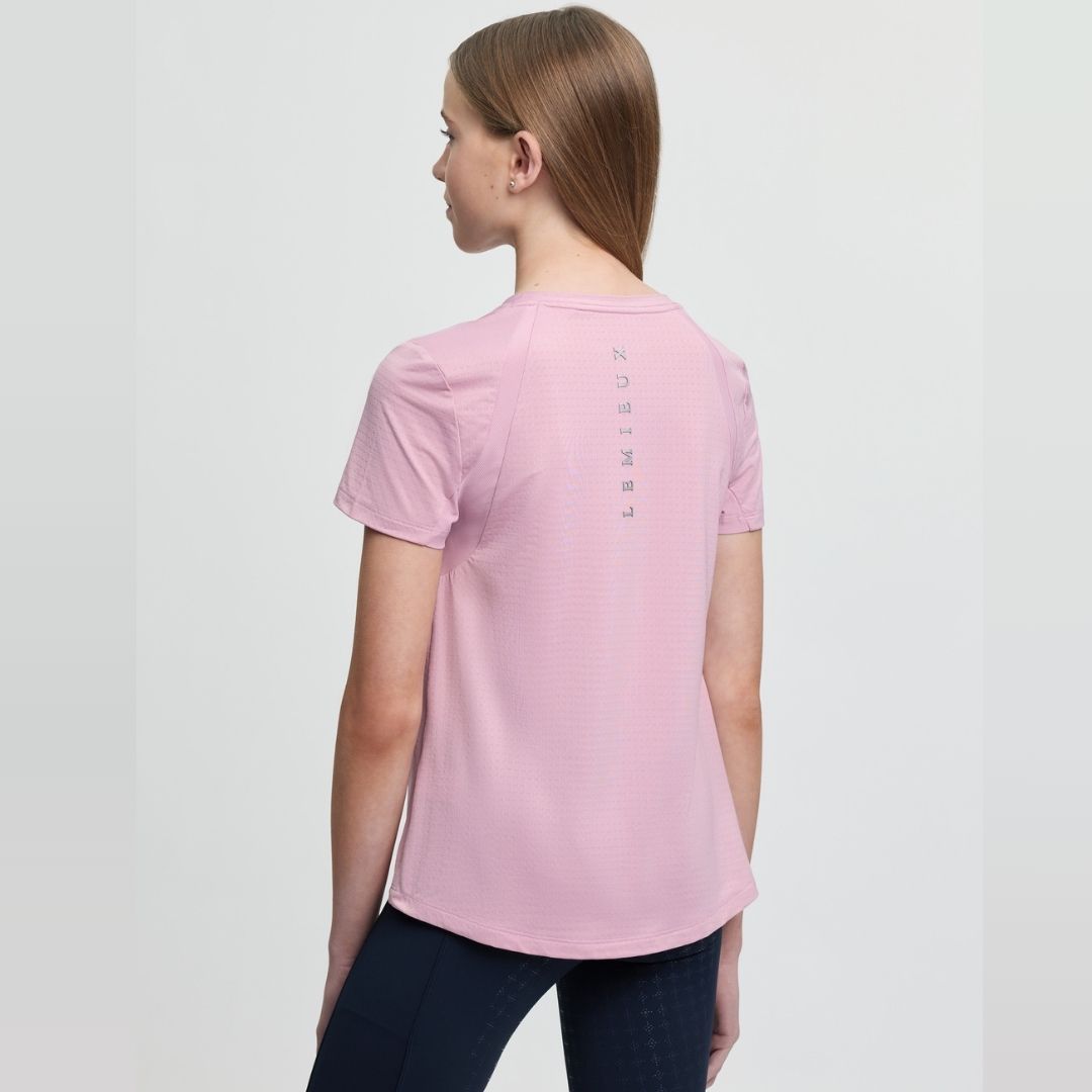 LeMieux Young Rider Sports T-Shirt - Fondant Pink; back view worn by girl on gray background | Malvern Saddlery