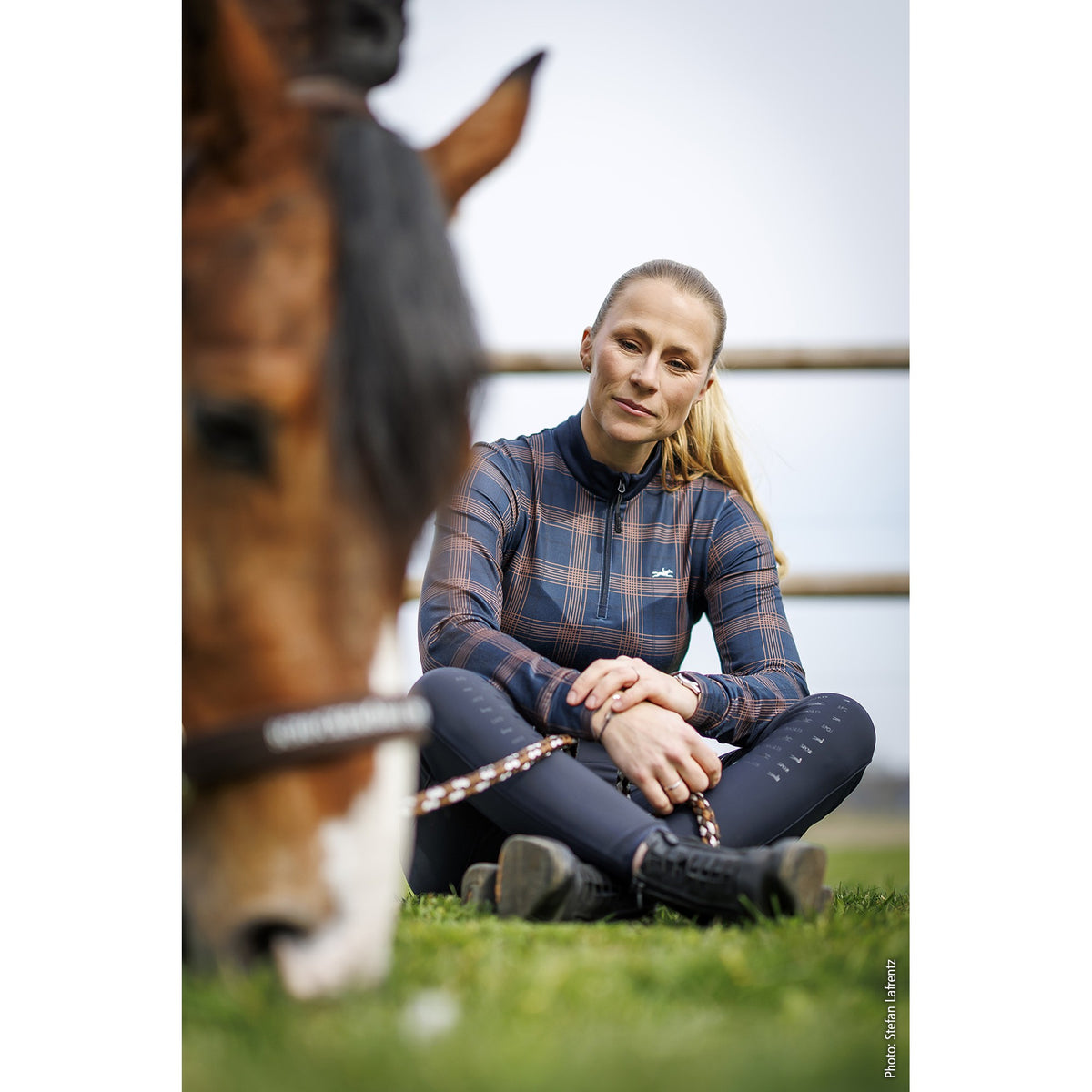Schockemöhle Xandra Style Women's Training Shirt in Navy Checker worn with a horse