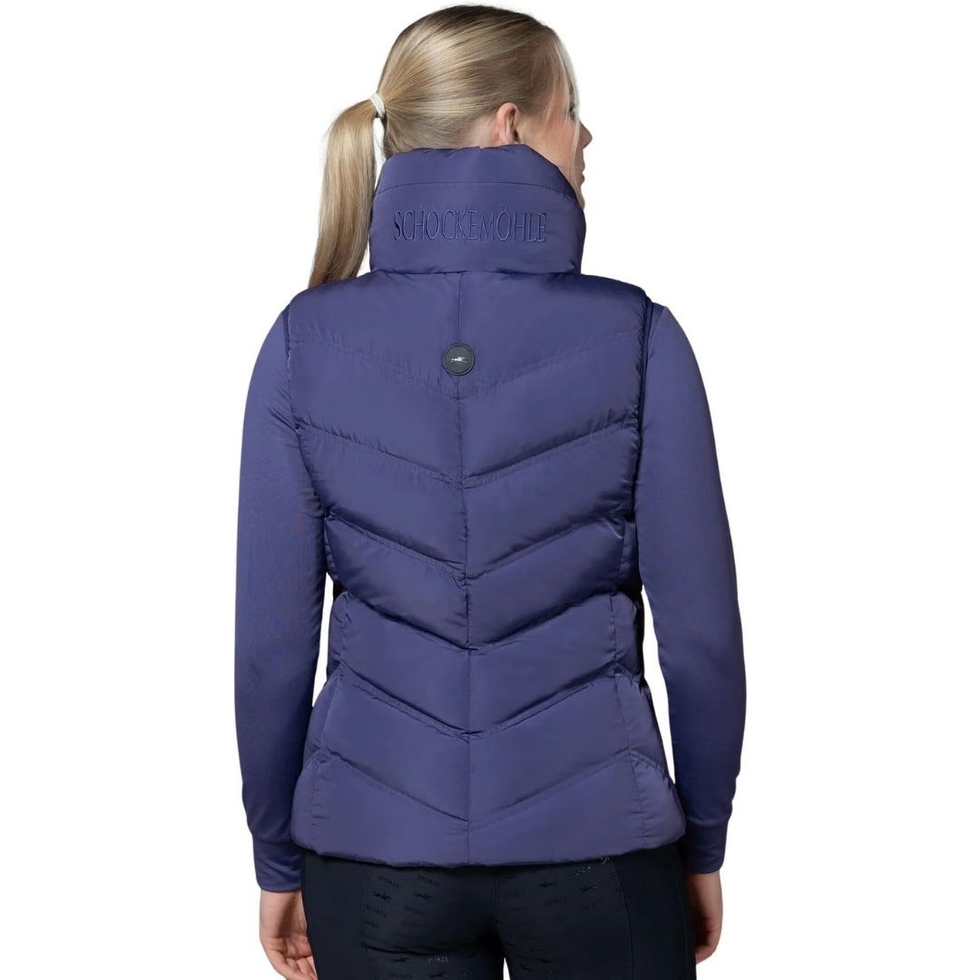 Schockemöhle Sports SPMarleen Style Quilted Ladies Vest - Ink Blue, back view on women with white background | Malvern Saddlery
