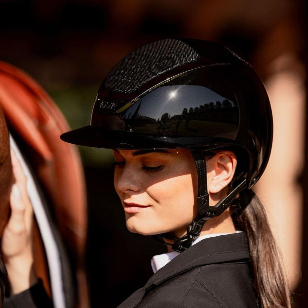 KASK Star Lady Pure Shine Equestrian Helmet - Black, lifestyle image | Malvern Saddlery