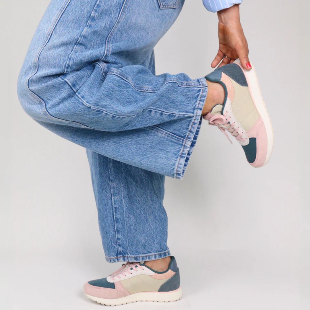 Woden Ronja Sneaker -Ivory Multi color with pink, gray - shown on model wearing wide leg jeans| Malvern Saddlery