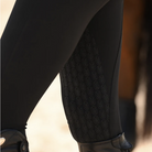 WON Equestrian Stay Dry Waterproof Breeches - Black, knee grip detail | Malvern Saddlery