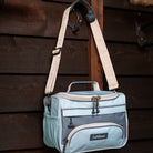 LeMieux ProKit Lite Grooming Bag - Petrol/Glacier shown hanging on hook | Malvern Saddlery