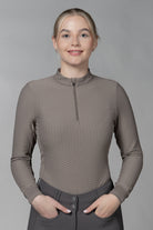 Schockemöhle SPGail Style Shirt - Hazel Brown, on model with gray background | Malvern Saddlery