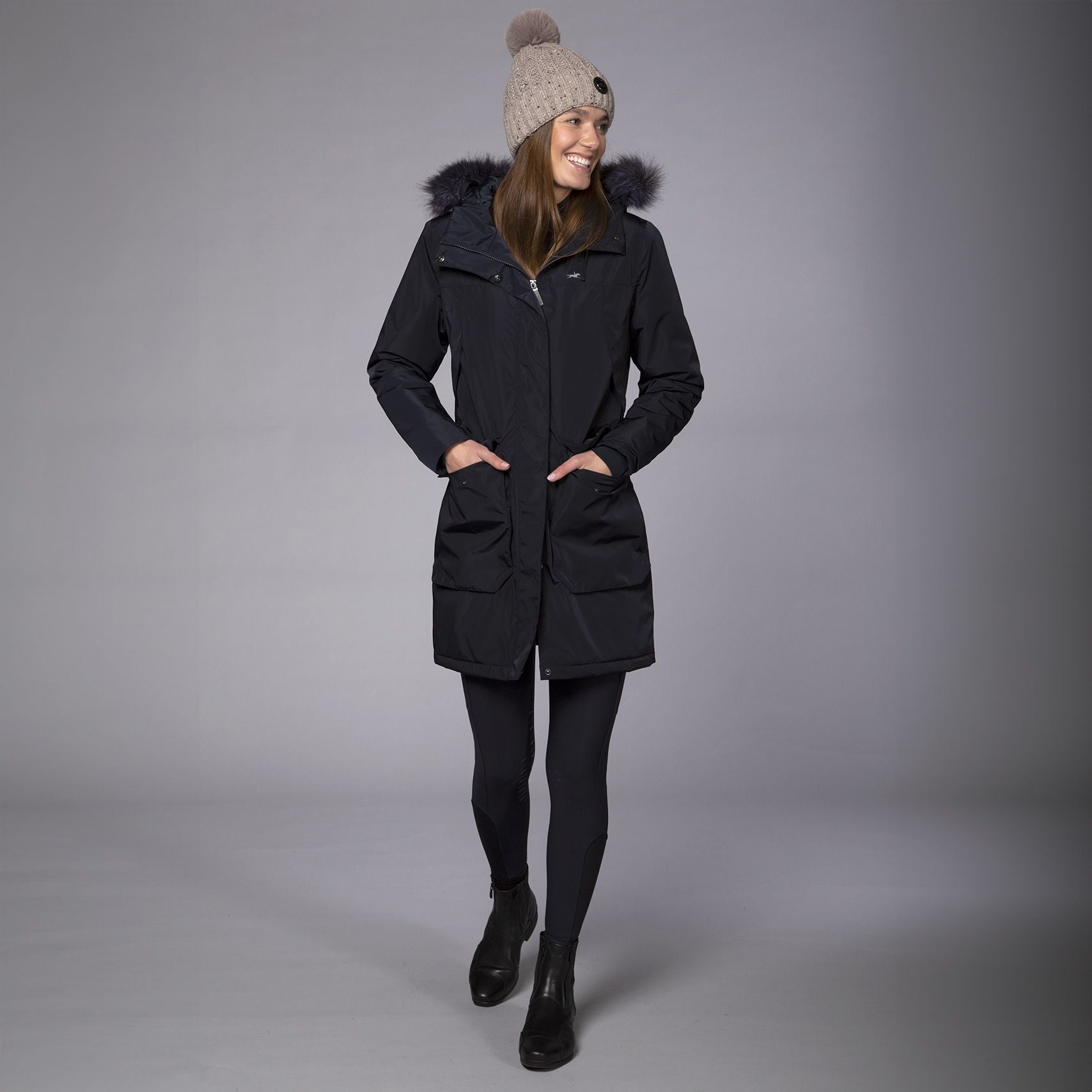 Schockemöhle Daisy Parka - Deep Night, shown on model with Melange Oatmeal Beanie | Malvern Saddlery