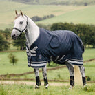 LeMieux Arika Featherweight Rug - Navy, shown on gray horse | Malvern Saddlery