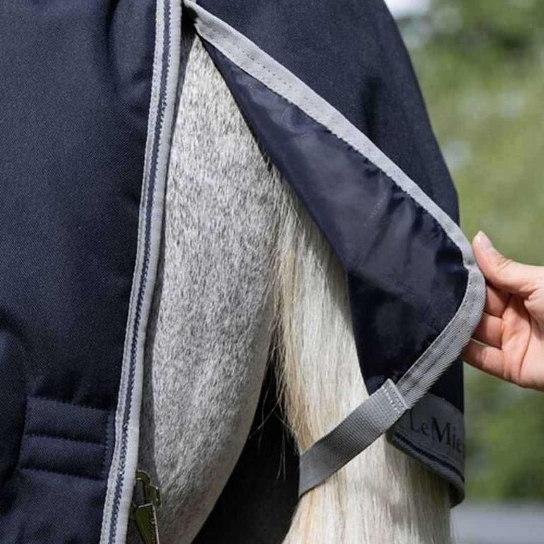 LeMieux Arika Featherweight Rug - Navy, shown on gray horse, tail cover detail | Malvern Saddlery